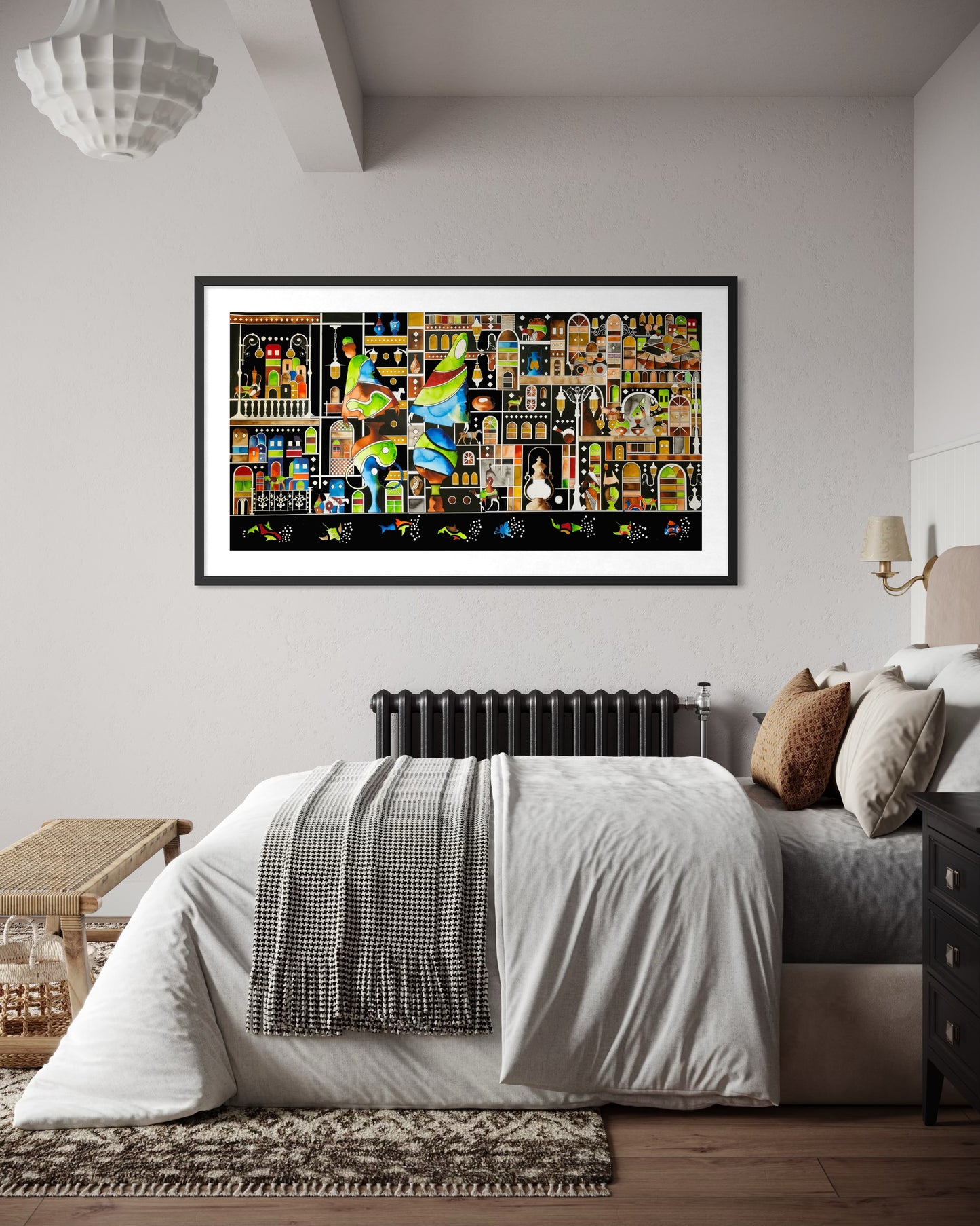 Framed collage art piece on a wall above a bed in a bedroom.
