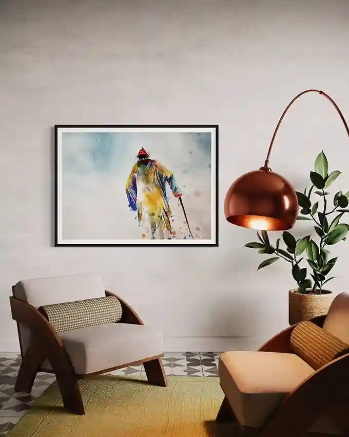 Living room with a colorful art print by artist Galal Yousif on the wall, modern furniture, and decorative elements. in UAE.