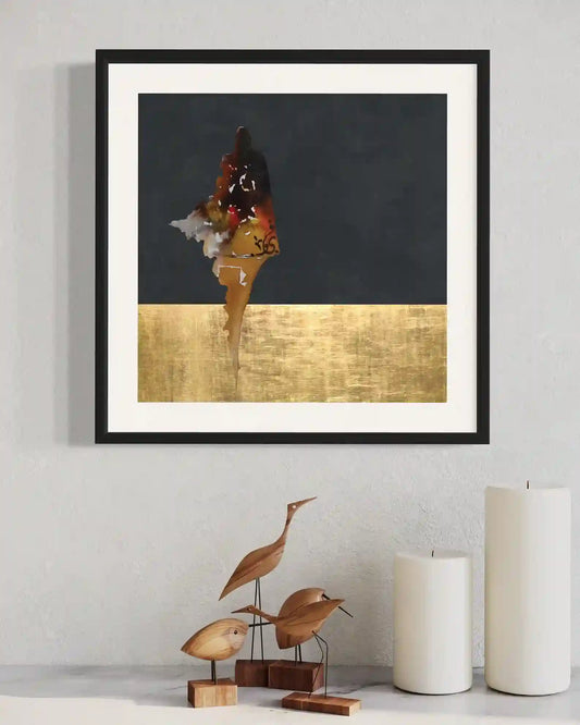 Celebration of Self digital art print in black frame above wooden bird sculptures and white vases in home decor