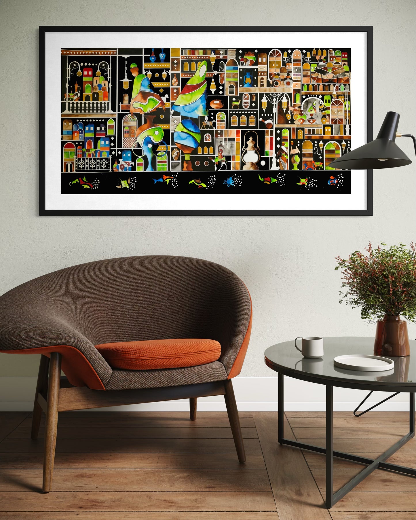 Colorful abstract art piece on a wall above a modern brown chair with an orange cushion.
