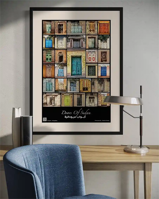 Doors of Sudan framed poster mockup in modern office showing colorful Sudanese doorway photography wall art home decor