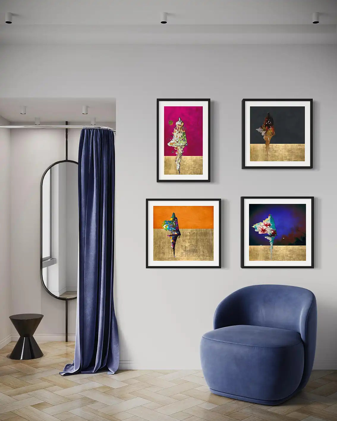 Four framed art prints including 'Untouchable' displayed as gallery wall in modern living room with blue velvet chair